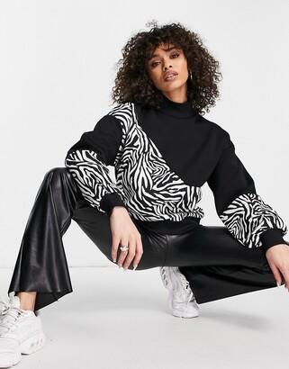 Qed London high neck sweater in animal print