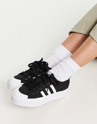 adidas Nizza platform sneakers in black and white - ShopStyle