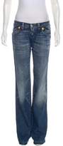 Thumbnail for your product : DSQUARED2 Distressed Low-Rise Jeans
