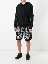 Thumbnail for your product : Givenchy tattoo print Bermuda shorts