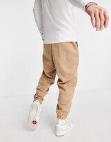 Thumbnail for your product : ASOS DESIGN oversized trackies in brown vintage wash (part of a set) - BROWN
