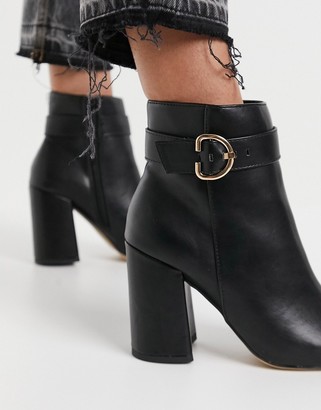 London Rebel block heel ankle boots with gold trim in black