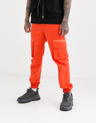 ASOS DESIGN cargo trousers in orange