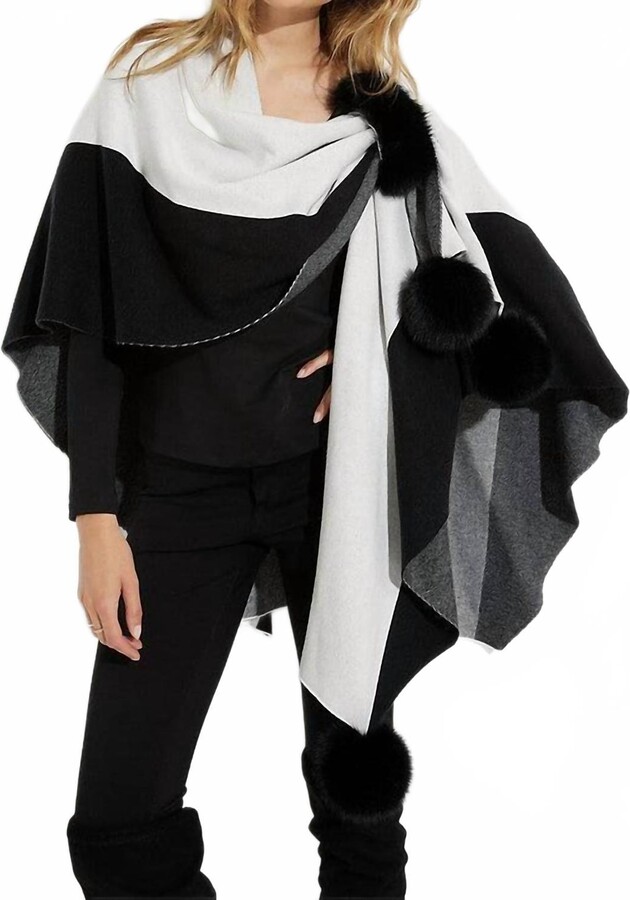 Joseph Ribkoff Tamara Two-Tone Poncho With Faux Fur Pom Poms In Black And Vanilla