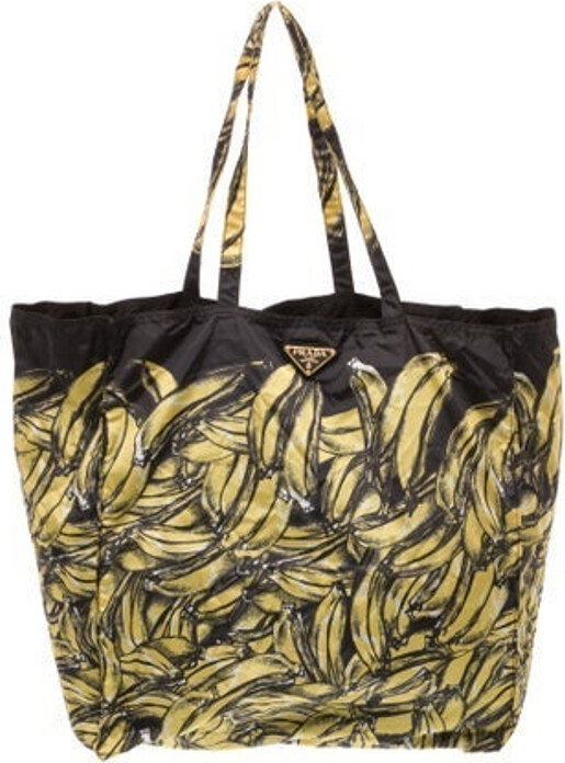 Prada Tote Black & Yellow Nylon Printed Gold-Tone Hardware Dual Shoulder Straps Nylon Lining & Single Interior Pocket Open Top Includes Interior Zip Pouch