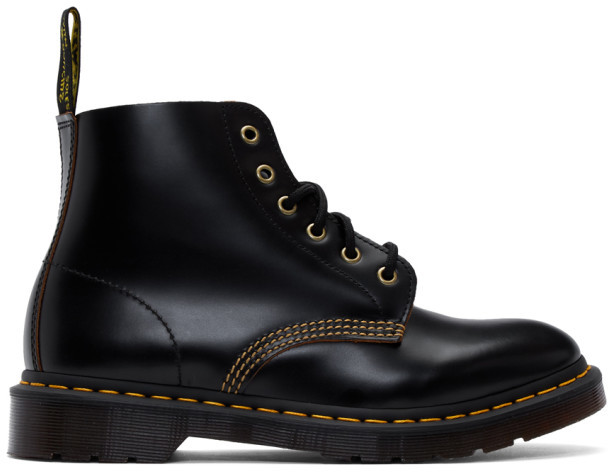 black leather boots with gold hardware