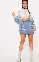 Thumbnail for your product : PrettyLittleThing Roschian Vintage Wash Super Distress Denim Mini Skirt