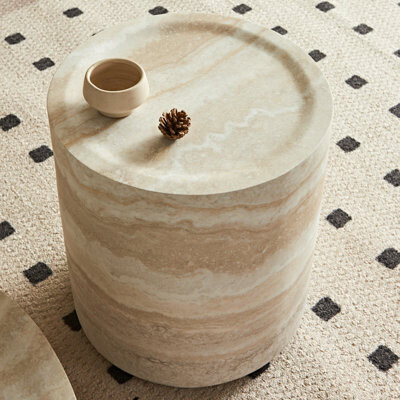 Latitude Run Wave-patterned round coffee table in a modern style with unique natural texture and a splash-proof concave tabletop.