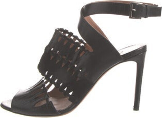 Alaia Leather Sandals Black Cutout Accent & Suede Trim Buckle Closure at Ankles Unfortunately, due to restrictions, this item may not be eligible for shipping in all areas.