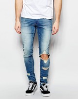 Thumbnail for your product : ASOS Extreme Super Skinny Jeans With Extreme Rips