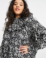 Thumbnail for your product : Vero Moda Curve mini smock dress with ruffle detail in black smudge print