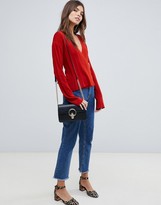 Thumbnail for your product : ASOS DESIGN wrap jumper in rib with buckle detail