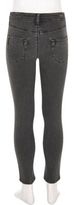 Thumbnail for your product : River Island Girls black washed Molly ripped jeggings
