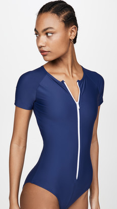 swimwear with sleeves and shorts