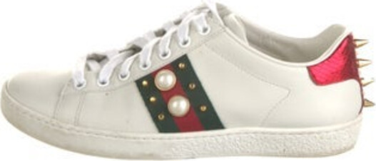 Gucci Leather Low Top Sneakers White Faux Pearl Accents & Web Accent Rubber Trim Grosgrain & Studded Accents Round-Toes Lace-Up Closure at Uppers Includes Box & Dust Bag Designer