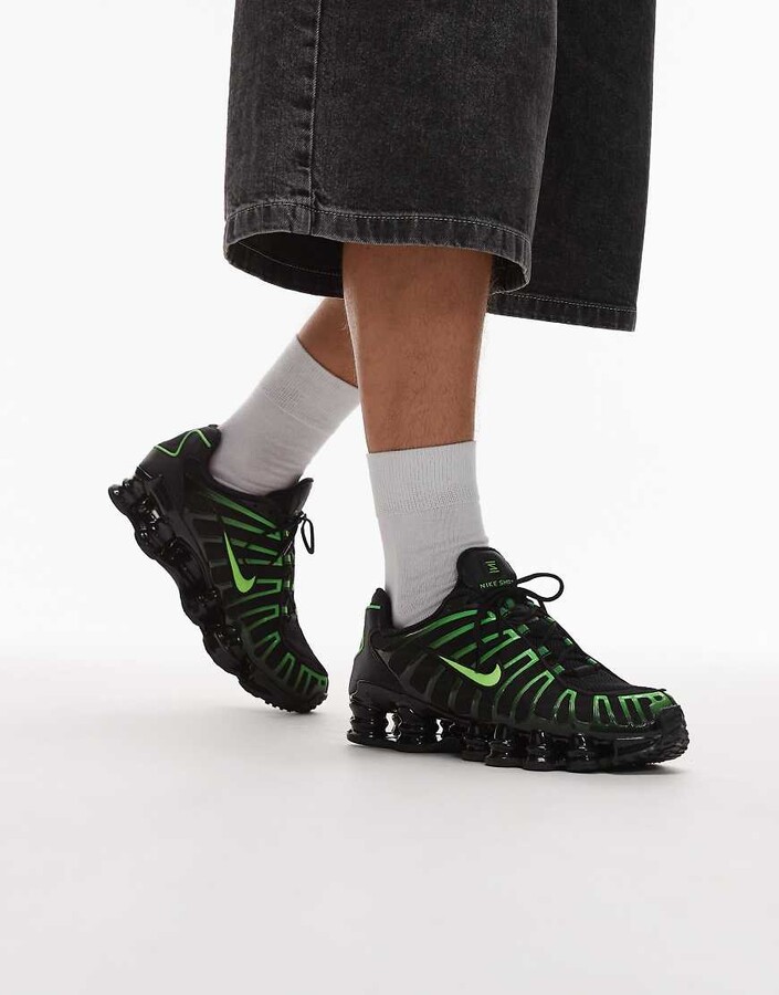 Nike Shox TL sneakers in black and green