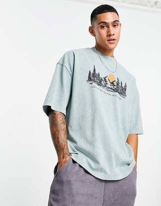 ASOS DESIGN oversized heavyweight t-shirt in washed blue with landscape  chest print - ShopStyle