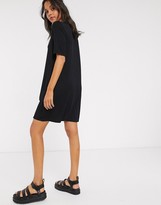 Thumbnail for your product : ASOS DESIGN DESIGN Tall swing t-shirt dress with concealed pockets in black
