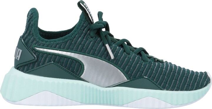 Puma Defy Tz Wn's Sneakers Dark Green - ShopStyle