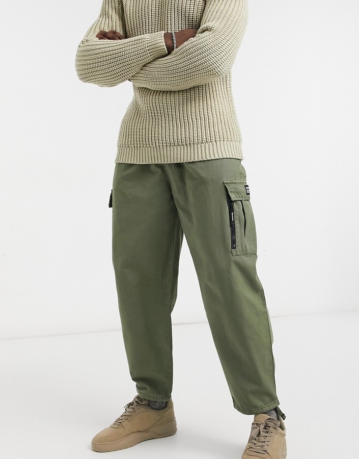 Bershka cuffed cargo pants in khaki ShopStyle