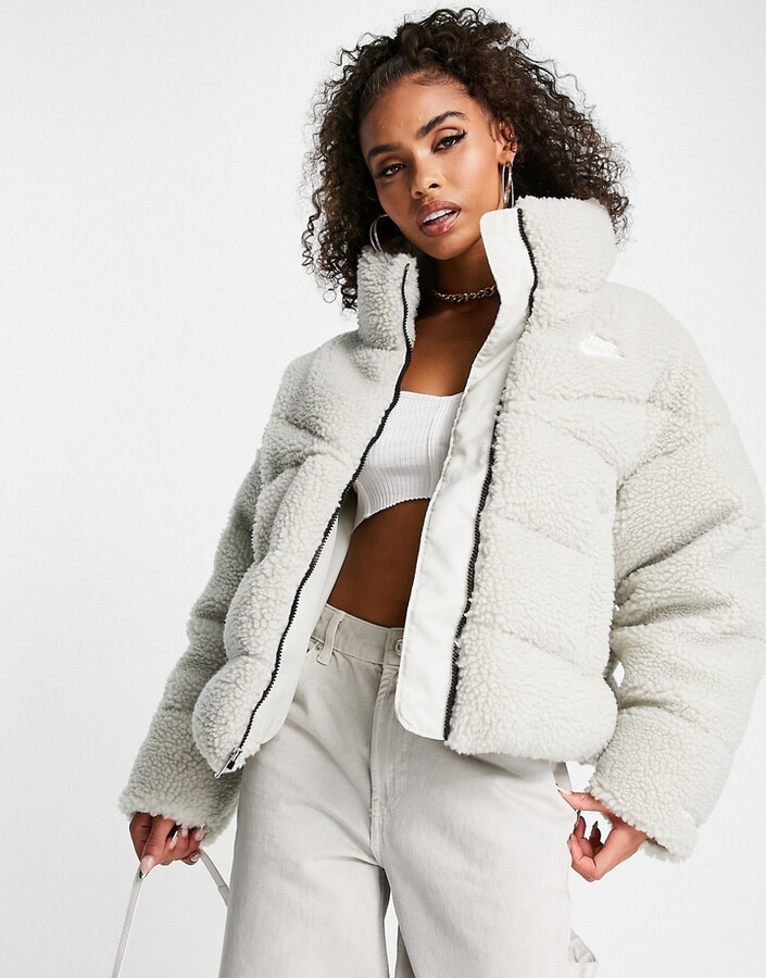 Nike ThermaFit City jacket in beige - ShopStyle