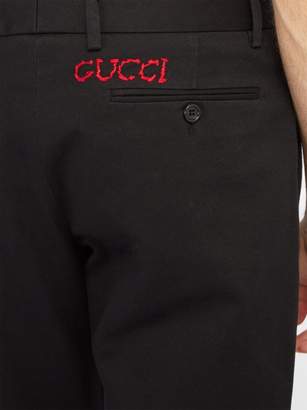 Gucci Embroidered Cotton Chino Trousers - Mens - Black