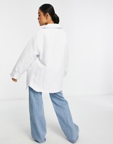 Thumbnail for your product : ASOS Petite ASOS DESIGN Petite nylon tech shacket with quilted lining in white