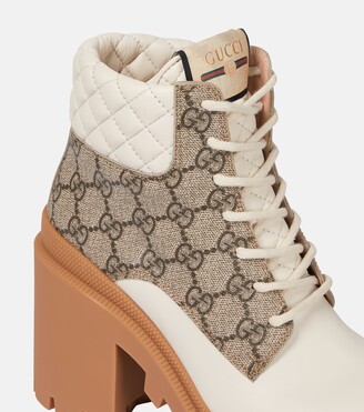 Gucci GG canvas and leather lace-up boots