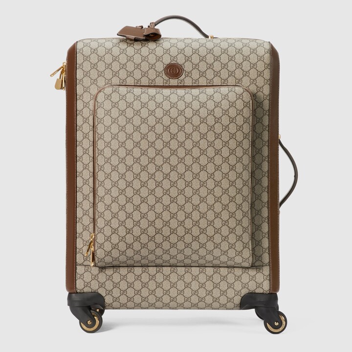 Gucci GG Supreme medium trolley - ShopStyle Backpacks