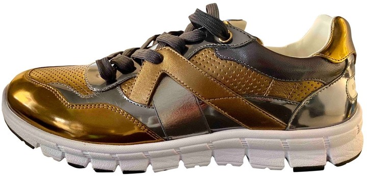 dolce and gabbana gold trainers