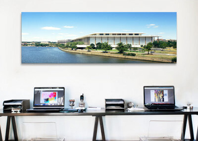 'Buildings along a riverPotomac River, John F. Kennedy Center for the Performing Arts, Washington DC, USA' by Panoramic Images - Panoramic Gallery-Wra