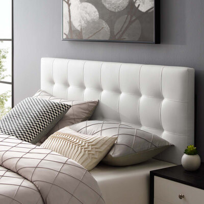 white cushioned headboard
