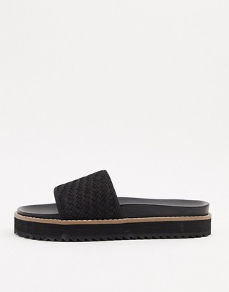 ASOS DESIGN sliders in leather with woven strap and chunky sole