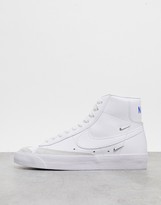 Thumbnail for your product : Nike Blazer Mid 77 trainers with metallic mini swoosh in white
