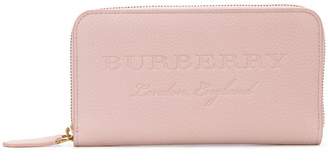 Burberry brand embossed zip around wallet