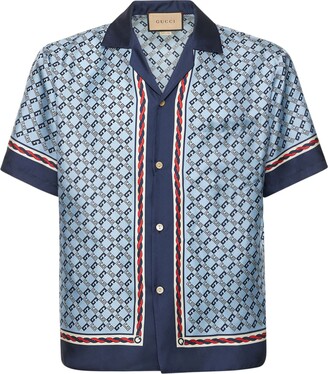 Geometric houndstooth print bowling shirt in blue and red