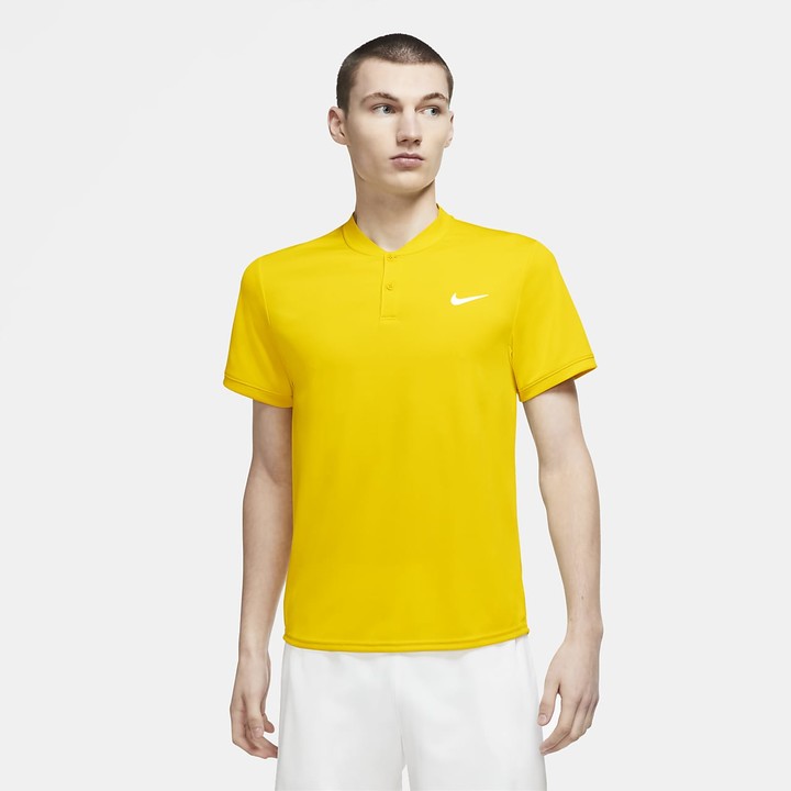 yellow nike polo shirt