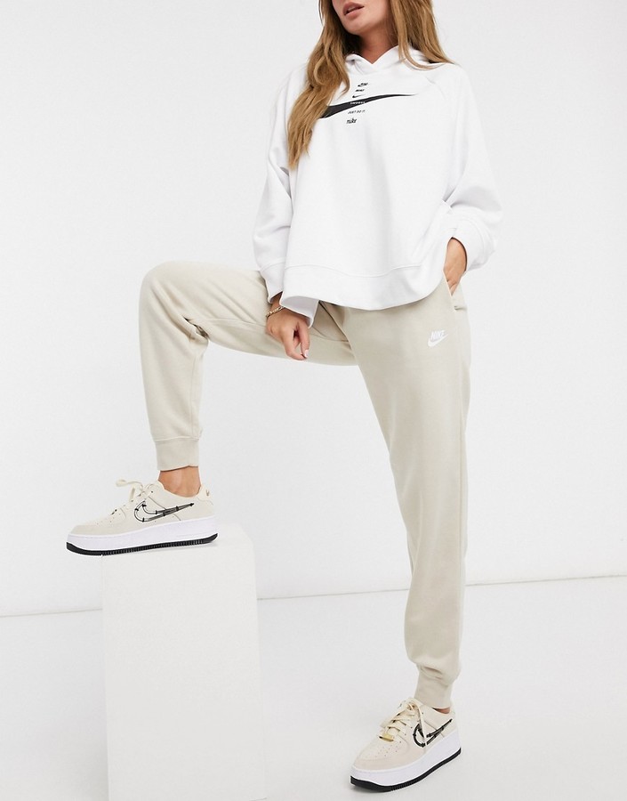 Nike essentials loose sweatpants in oatmeal - ShopStyle Activewear Pants