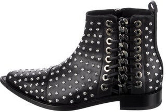 Alexander McQueen Leather Ankle Chelsea Boots Black Pointed-Toes with Studded Accents Exposed Zip Closure at Sides Includes Dust Bag Unfortunately, due to restrictions, this item may not be eligible for shipping in all areas.