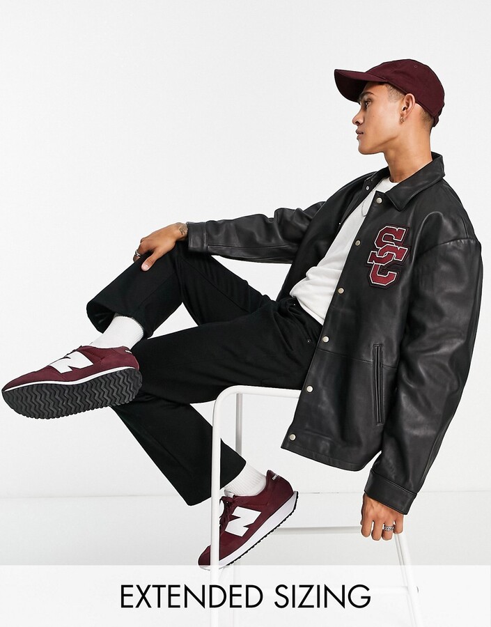 ASOS DESIGN oversized real leather varsity bomber jacket with embroidery in  black