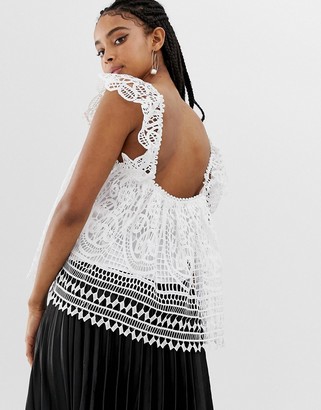 Amy Lynn broderie lace low back top