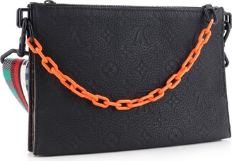 louis vuitton bag with orange chain