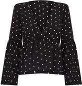 Thumbnail for your product : PrettyLittleThing Black Polka Dot Chiffon Flare Sleeve Top
