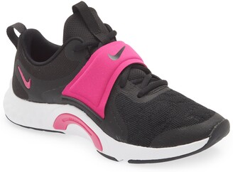 black nike with pink tick