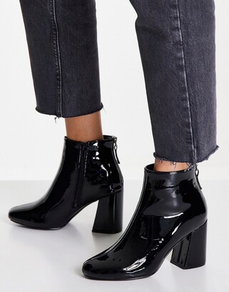 New Look patent heeled boot with flared heel in black - ShopStyle