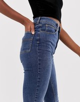 Thumbnail for your product : Collusion Tall x001 skinny jeans in mid wash blue