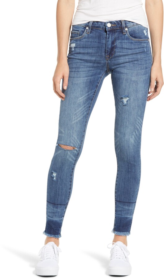 blank denim distressed skinny jeans