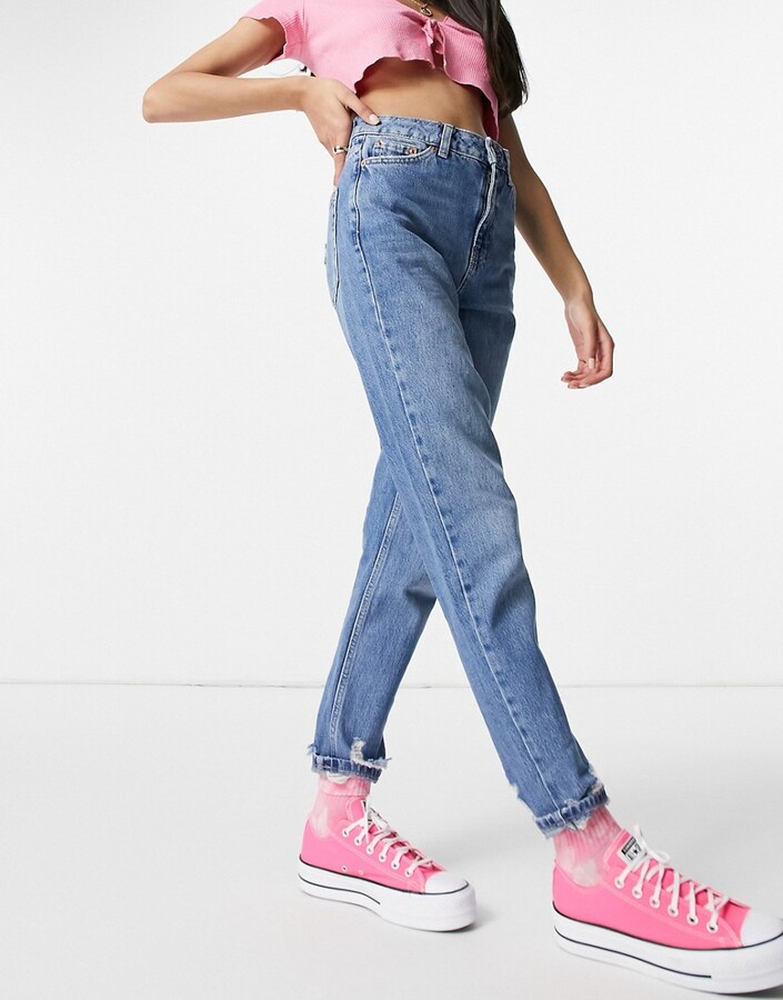 Topshop mom jeans with rip hems in mid blue - ShopStyle