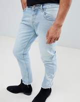 Thumbnail for your product : ASOS Design Slim Jeans In Light Wash Blue With Western Embroidery