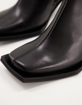 ASOS DESIGN heeled chelsea boots with extreme square toe and round heel in black leather